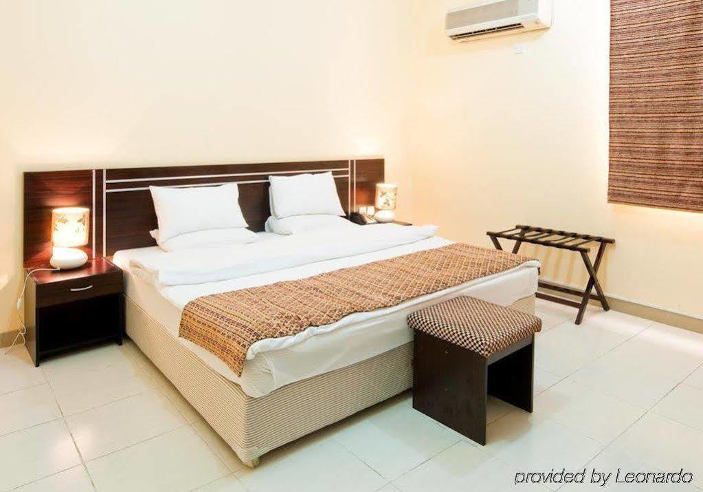 La Villa Hotel Doha Habitación foto